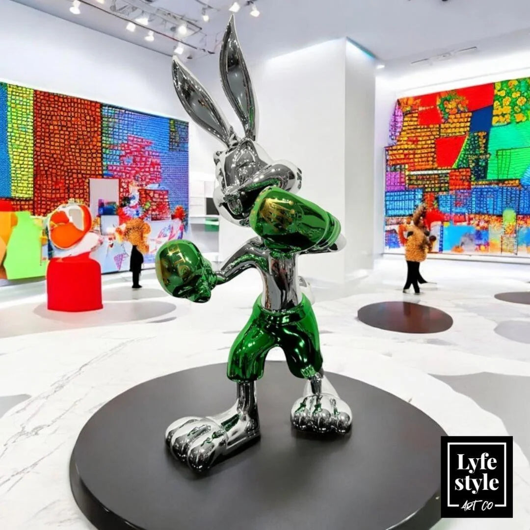 A single green leaf against a white background.